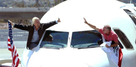 Image: Sir Richard Branson and Virgin America CEO Fred Reid celebrate the launch of flights from its San Francisco base in August.