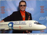 Image: Elton John helps promote AirTran