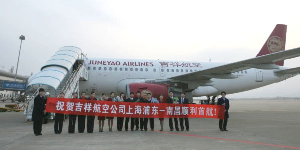 Image: Crew and staff from Juneyao Airlines