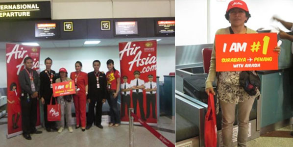 In spite of Idul Adha being celebrated in Indonesia at the moment, we managed to get these pictures through of the first passenger on Indonesia AirAsia’s route to Penang from Surabaya.