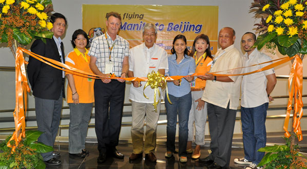 Manila to Beijing....in sneekers and those trademark yellow shirts 
