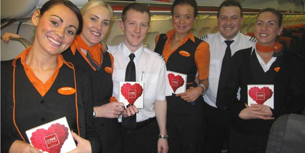 Okay, these are not cakes but Belgian chocolates, recognisably the world’s finest, handed out by Brussels Airport’s marketing team to all passengers and crew on the first flight from Liverpool ahead of Valentine’s. Is anyone else wondering how old the crew member third from the left is? 12? 14? 8? Get this – he’s the pilot! Send us your guess and we’ll find out. The first reader to get it right wins a one-way sector to a mystery easyJet destination from Bucharest.