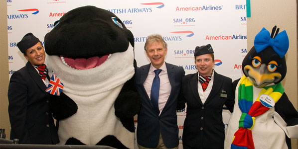 Smiling broadly British Airways’ new Chief Executive, Keith Williams, poses with crew and Penny Penguin on arrival in San Diego from Heathrow on June 1 after BA resumed services to the Californian city for the first time since 2003. BA’s links to the US generate a massive 38% of its capacity at Heathrow.