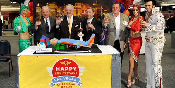 Celebrating that Southwest Airlines has served Las Vegas for 30 years with a spectacular cake were Clark County Director of Aviation Randall H. Walker, LVCVA Host Committee Chair Oscar B. Goodman, LVCVA President/CEO Rossi Ralenkotter and Southwest’s SVP Procurement Daryl Krause.