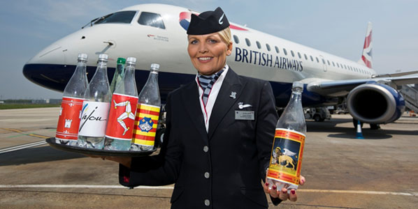 British Airways’ performance manager Julie O’Neill demonstrates the airline’s new routes out of London City Airport with labelled bottles.