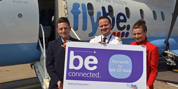 Cabin crew Ross Ellis and Karen Paterson flanked First Officer Andrew Whiteman as they posed for the camera ahead of the inaugural flight from Norwich to Isle of Man.