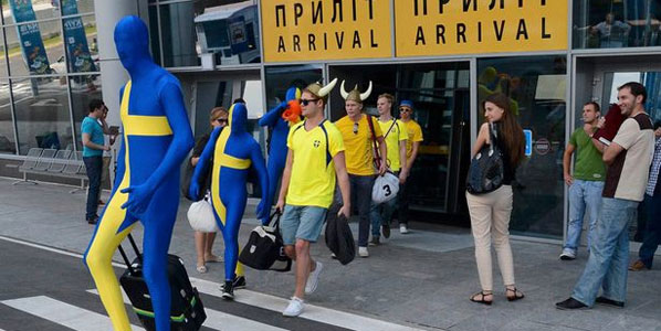 Swedish fans try hard to sensitively blend in as they arrive at Kiev’s low-cost Zhulyany airport.