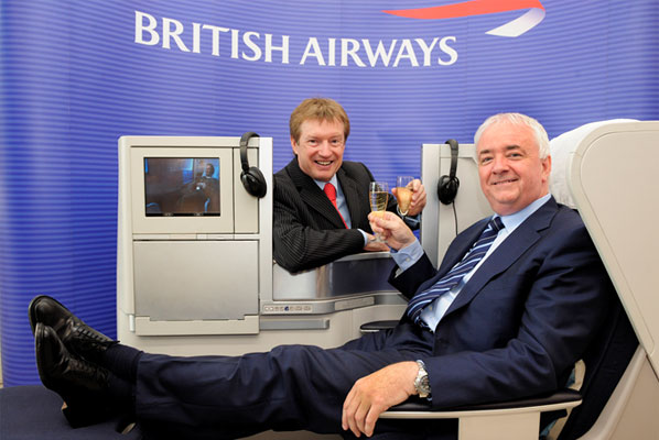 Leeds Bradford Airport’s Commercial Director, Tony Hallwood, and CEO John Parkin, try out an authentic replica of the cabin for their new British Airways Heathrow service.