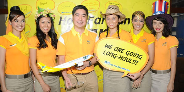 February 2012: Cebu Pacific’s President and CEO, Lance Gokongwei, celebrates the wide-body aircraft announcement with his crew. 