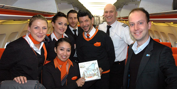 Jan Van de Reyd, Brussels Airport’s Manager Aviation Marketing (right), welcomed the delighted easyJet crew operating the inaugural flight from Basel with Belgian chocolates.