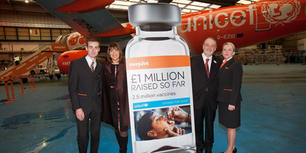 Carolyn McCall, easyJet’s CEO; and David Bull, UNICEF’s CEO, flanked by easyJet’s crew members Scott Tatcher and Cathy Clancy – posed for a commemorative picture to thank passengers who have helped raise £1 million for UNICEF.