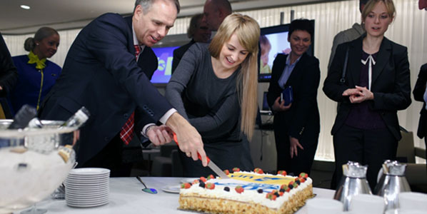 Cutting the celebratory cake were Schiphol’s Marketing Director Marcel Lekkerkerk, and the airline's VP International Sales, Daria Kalenskaya.