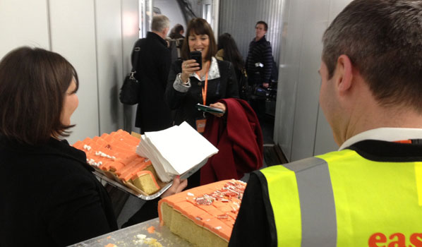 easyJet CEO Carolyn McCall is clearly impressed by the anna.aero-crafted launch cake