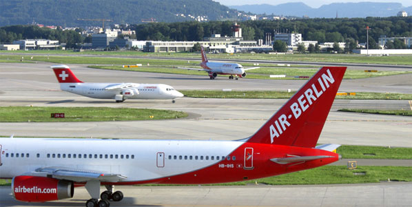 airberlin and Swiss aircraft on the runway.