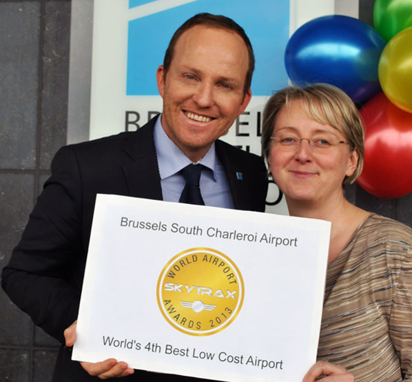 Celebrating their position as the ‘World’s Fourth Best Low Cost Airport’ in the Skytrax awards are David Gering, Communication & Public affairs Director and Ingrid Tahon, Aviation Executive from Brussels South Charleroi Airport.