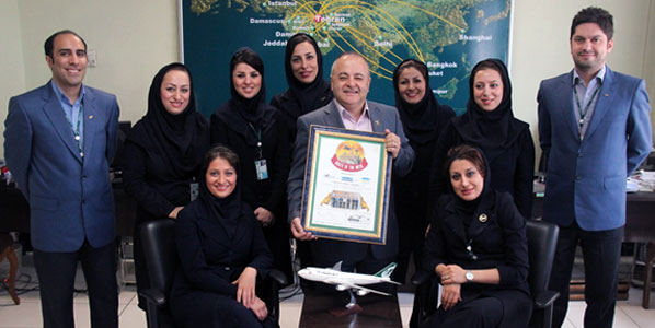Proudly posing for a commemorative picture were Fariba Bayati, Route Development Manager; and Hossein Hosseini, the airline’s Director Marketing and Route Development (both in the middle), together with their route development team.