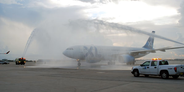 The traditional water cannon salute awaited XL Airways' maiden arrival in Florida.