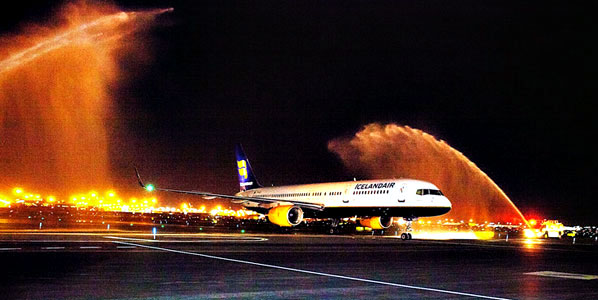Icelandair lands with a show of specially-themed fire truck water arches.