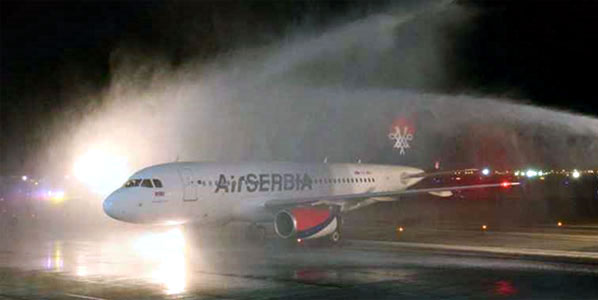 A rare damp, foggy evening in Abu Dhabi welcomes in Air Serbia