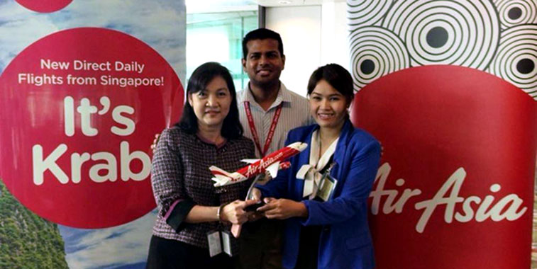 Celebrating the launch of Thai AirAsia flights between Singapore and Krabi are (left to right); Inthira Vutthisomboon, Assistant Director of Tourism Authority of Thailand (Singapore Office); Logan Velaitham, CEO of AirAsia in Singapore; and Sirapussorn Vonpida, Marketing Officer of Tourism Authority of Thailand (Singapore Office).
