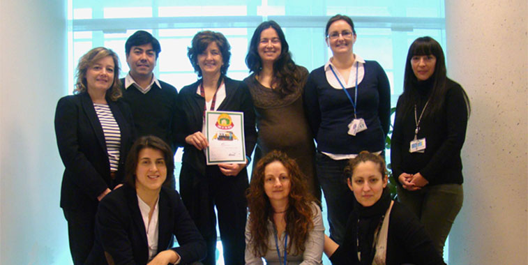 The Barcelona Airport team shows off their Cake of the Week award.
