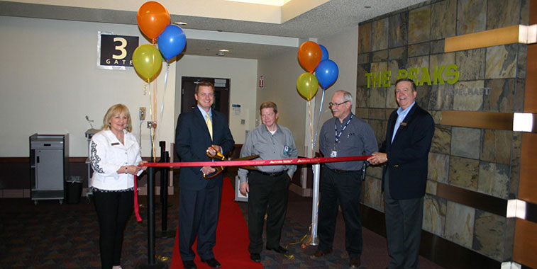 Cutting the celebratory ribbon marking the launch of Allegiant Air’s twice-weekly flights to Phoenix-Mesa Airport in Arizona.