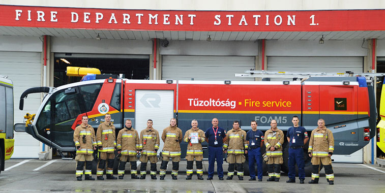 Proudly showing off their second ‘Arch of Triumph’ certificate for 2014 are the firefighters from Budapest Airport