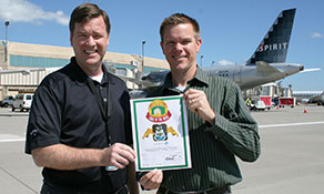 Kansas City Airport shows-off certificate for Spirit Airlines’ five new routes