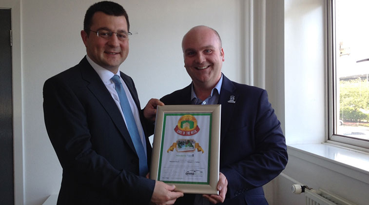Glasgow Airport’s Steven Marshall, and Francois Bourienne, celebrate with the certificate for ‘Cake of the Week’