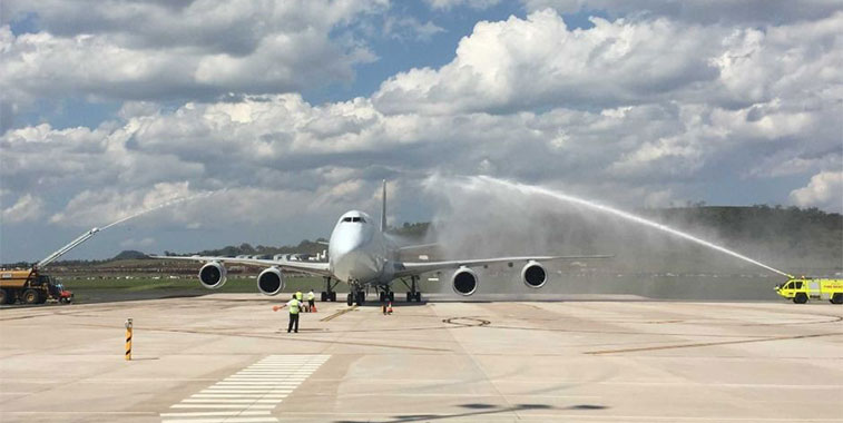 On 23 November, Brisbane West Wellcamp Airport welcomed its first trial 747-8 cargo flight. The flight was welcomed to the airport with a traditional water arch salute before being loaded with 50 tonnes of cargo including frozen beef from Australia's third largest processor, Oakey Beef Exports. John Wagner, Chairman of Wagners, the corporation which built West Wellcamp, Australia’s first airport to be constructed in 44 years, commented about the flight by saying: “It's a fantastic day for Toowoomba, for our region, for our state and the nation to be able to use this infrastructure to take fresh produce from the Darling Downs and outlying regions up to Asia to feed half the world's population.” It is hoped that the flight could lead to more regular services. 