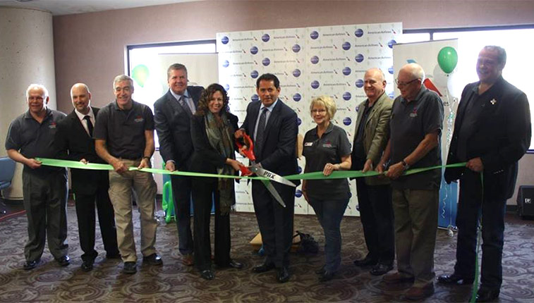 Cutting the ribbon in Phoenix at the start of services to Lubbock, Memphis