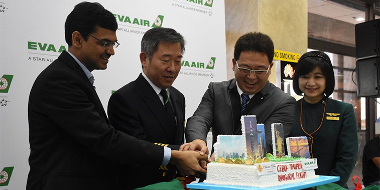 Preparing to cut the cake in Cebu to celebrate the launch of EVA Air’s new daily service from Taipei