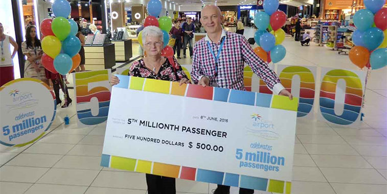 8 june cairns airport celebrated passing five million passengers in 12 month period