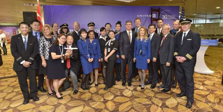 united airlines singapore airport staff celebrate star alliance members daily service to san francisco